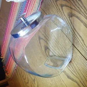 Tilted glass canister